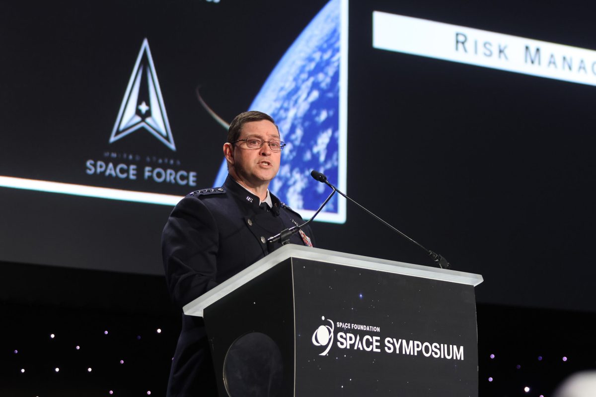 Photo of Chief of Space Operations Gen. Chance Saltzman standing at a podium