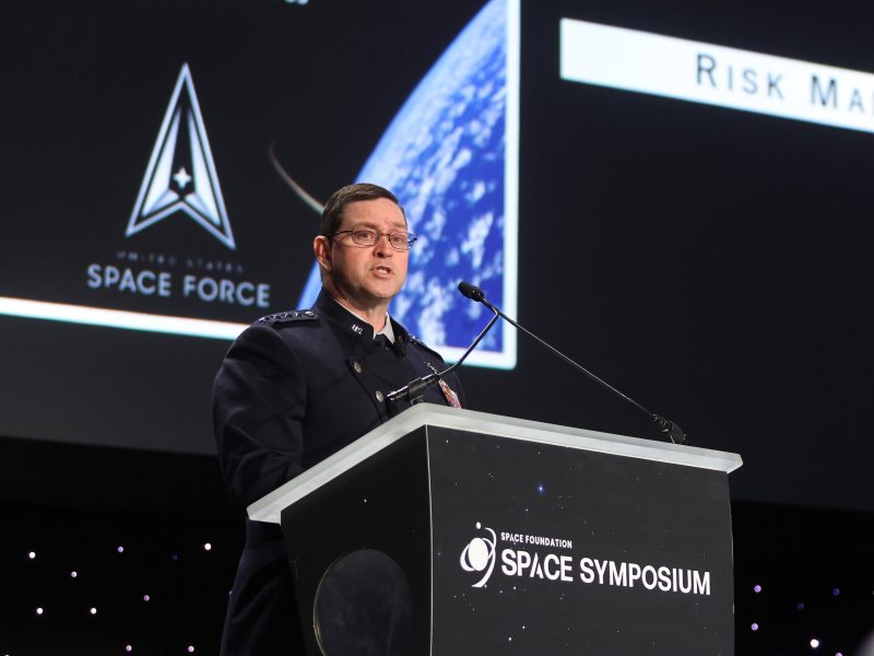 Photo of Chief of Space Operations Gen. Chance Saltzman standing at a podium