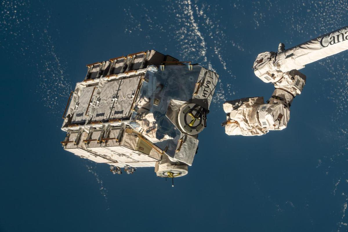 An external pallet packed with old nickel-hydrogen batteries was released from the Canadarm2 robotic arm in 2021 as the International Space Station orbited 260 miles above the Pacific Ocean west of Central America. Credit: NASA/Mike Hopkins