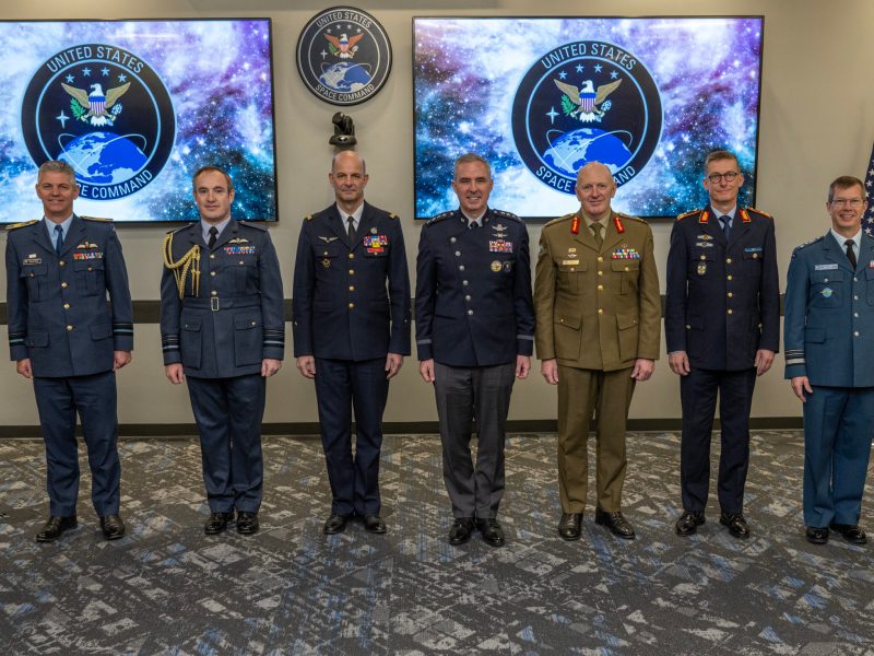 Photo of U.S. Space Force Gen. Stephen Whiting, U.S. Space Command commander (Center), standing with French Space Command Maj. Gen. Philippe Adam, French Air and Space Force space commander (Third from Left), and other senior leaders during a multilateral meeting about Operation Olympic Defender in Colorado Springs, Colorado on April 12, 2024.