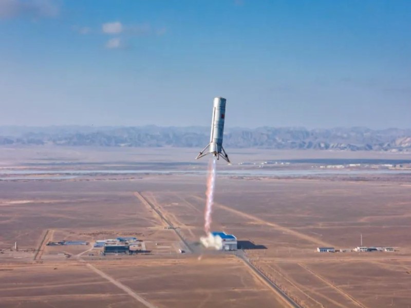 A Landspace Zhuque-3 prototype rocket stage, powered by a methane-liquid oxygen exhuast plume, in the skies above the desert at Jiuquan spaceport, Jan. 19, 2024.