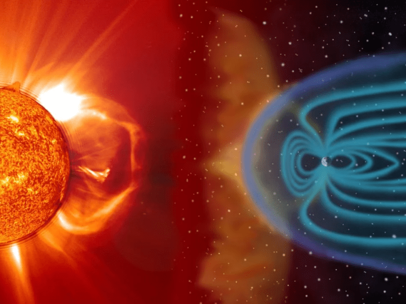 Illustration of the sun and the earth in which a solar flare is impacting Earth's magnetosphere.